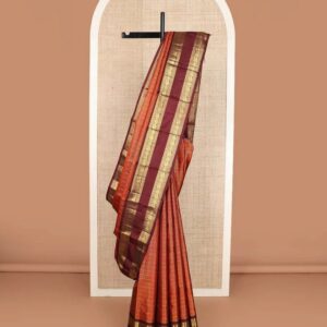 Orange zari checked Kanchipuram silk saree, contrast rettai pettu border of rekku, banaras, neli, and mayil chakram designs, and pallu of lavangam designs